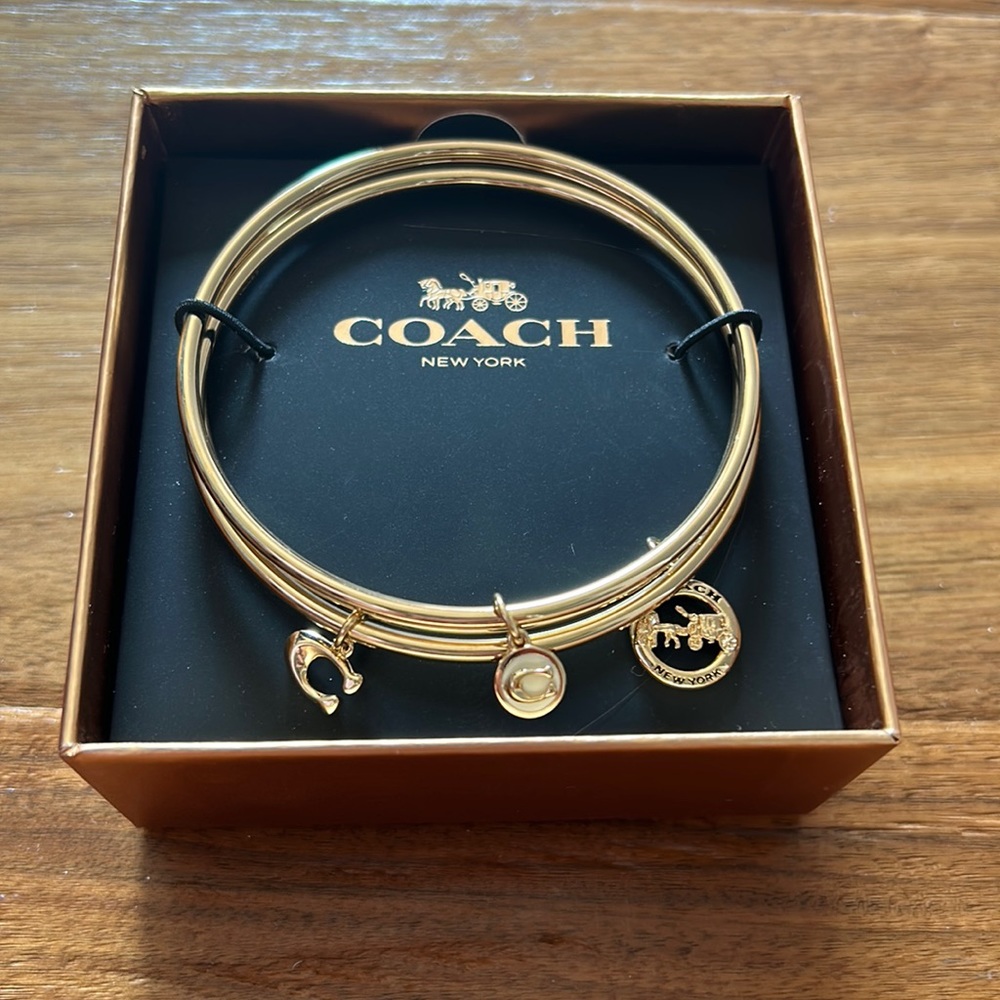 Coach gold bangle set. New in box, never worn!